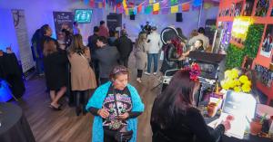 Dia de los Muertos celebration in El Clasificado office with loyal fans and community in Los Angeles CA