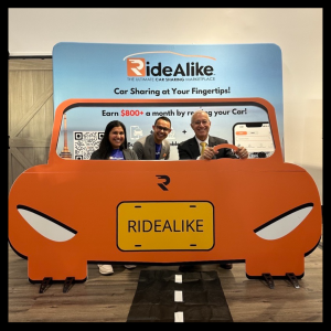 RideAlike Founders Zelani Bhuiyan & Abeda Bhuiyan pose with Minister of Economic Development, Job Creation and Trade of Ontario, Victor Fedeli at OVIN showcase with City of Markham & City of Vaughan