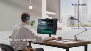 A user using the Lenovo ThinkCentre M90a Pro Gen 6 All-in-One, with Focusound Auto-tracking technology continuously adjusting the sound direction to keep the user in the optimal listening zone, no matter their position.