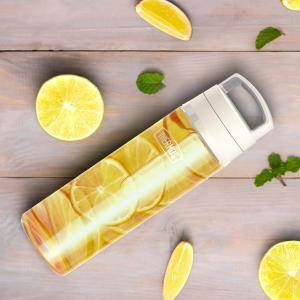 Thermos Brand new Icon™ Lightweight Water Bottle in Clear filled with infused lemon water.