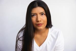 Photo of actress Joanna DeLane in white (photo by Steven Lee Busby)