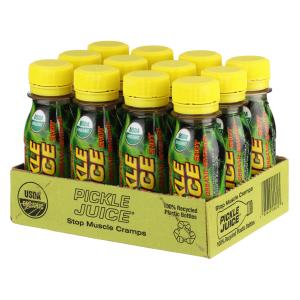 A case of Pickle Juice shots, displayed against a neutral background, showcasing its label and packaging